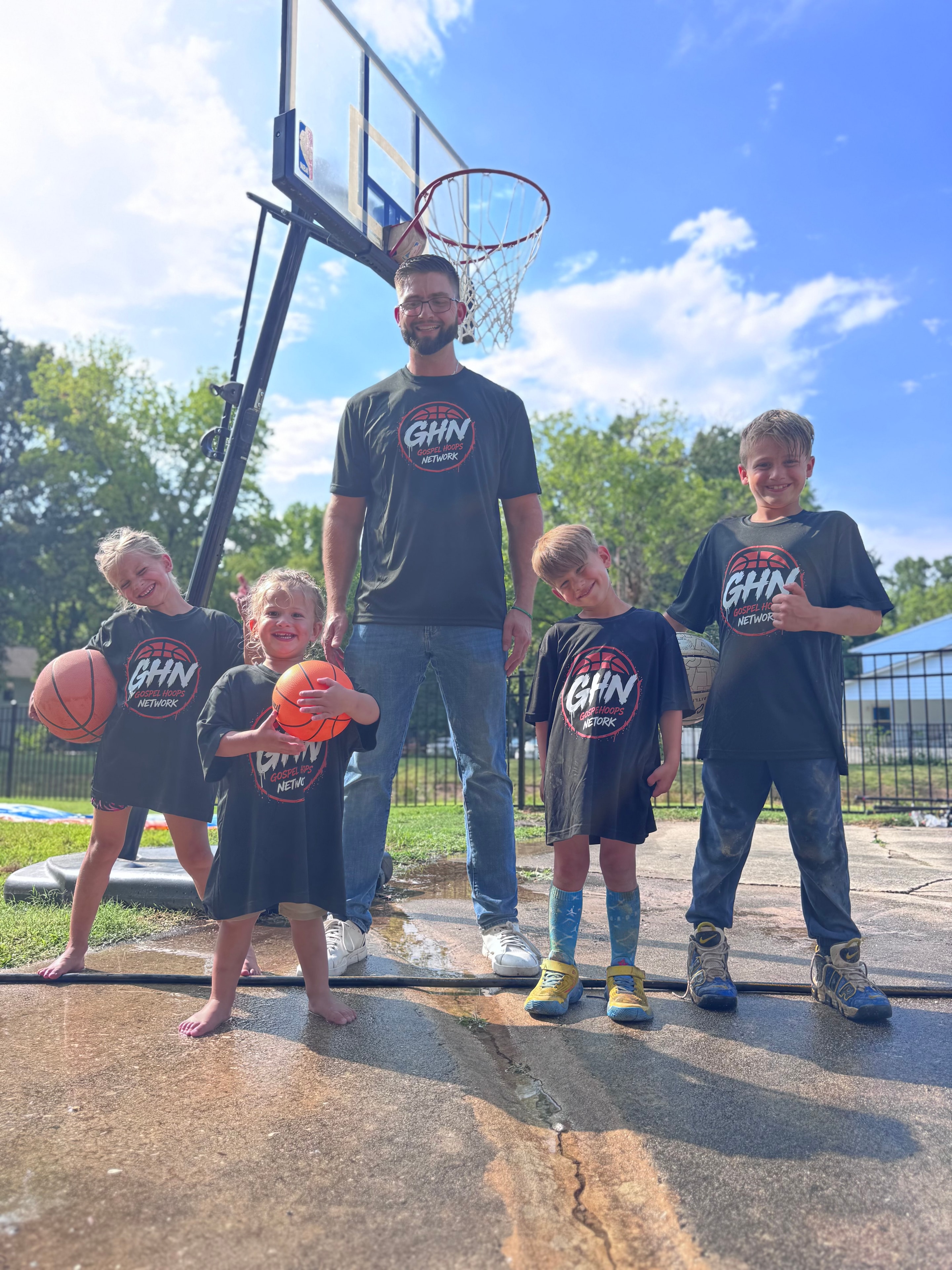 Kids repping GHN gear on the court